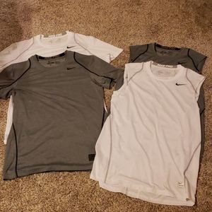 4 Nike Pro Dry Fit shirts (never worn)